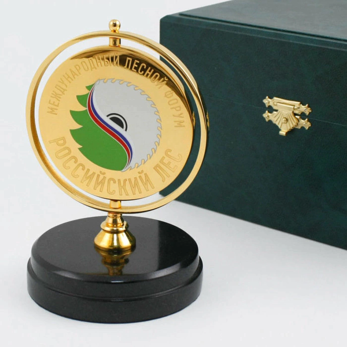 A medal spinning on a stand